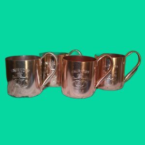 set of four Vintage Smirnoff Moscow Mule Copper Cup front logo